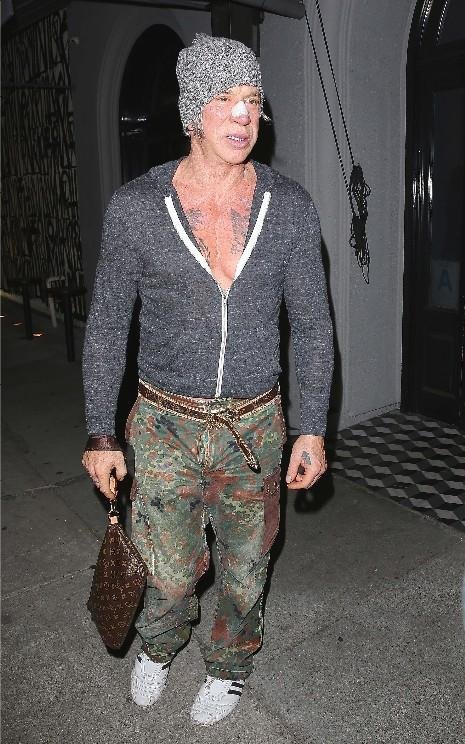 Mickey Rourke indulges love of fashion with matching Louis Vuitton