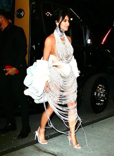 Kim Kardashian flashes Spanx in white skirt while out in New York